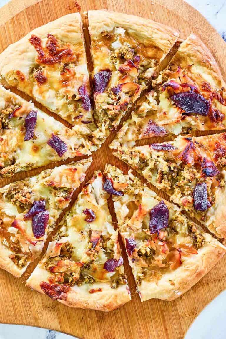 overhead view of Thanksgiving pizza on a pizza peel.