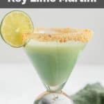 homemade Tommy Bahama key lime martini garnished with lime and graham cracker crumbs.