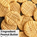a bunch of peanut butter cookies scattered on a platter.