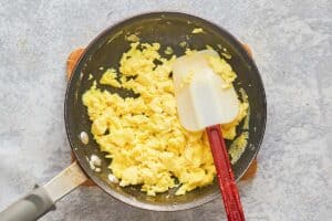 scrambled eggs in a skillet.