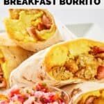 two homemade Burger King breakfast burritos cut in half on a plate.