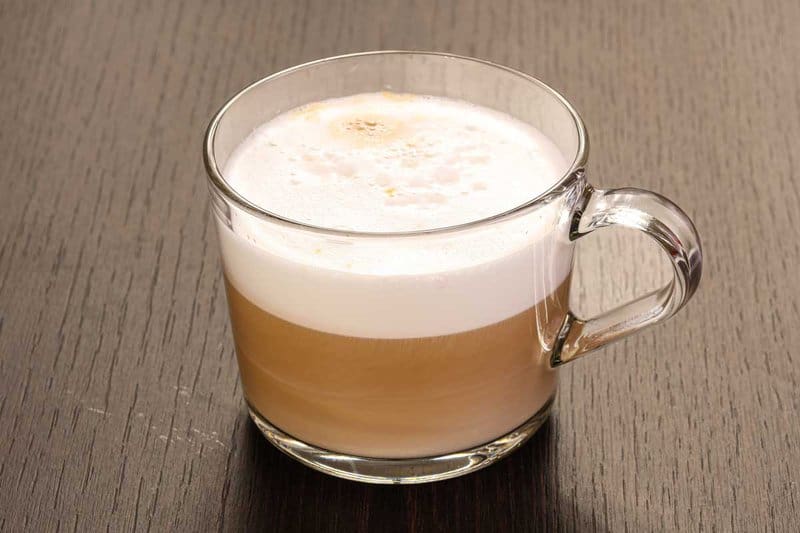 cappuccino in a glass mug.