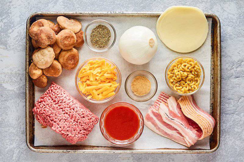 cheeseburger casserole ingredients on a tray.