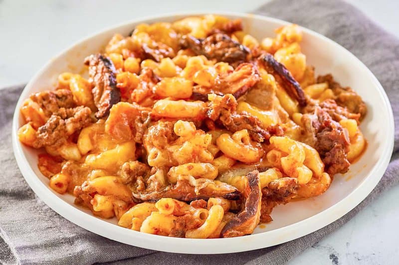 cheeseburger casserole on a white plate.