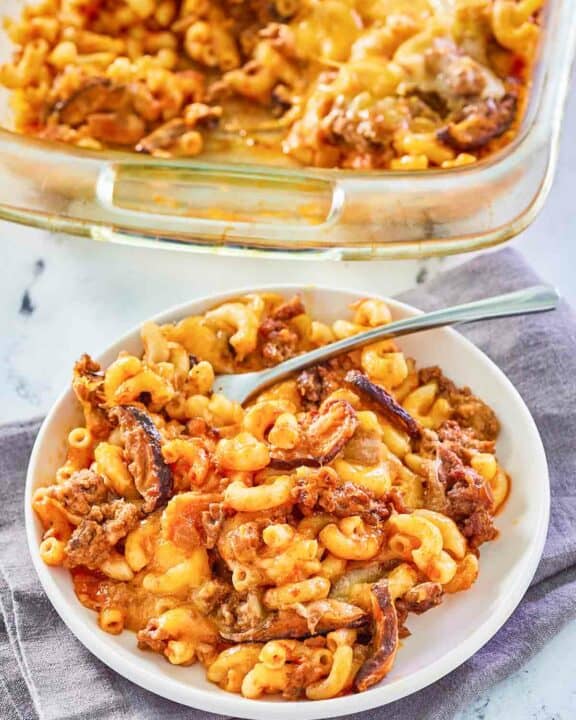 cheeseburger casserole on a plate and in a baking dish.