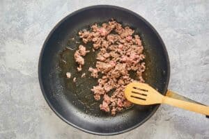 cooked ground beef in a skillet.