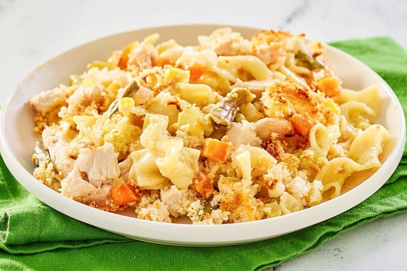 chicken noodle casserole serving on a plate.