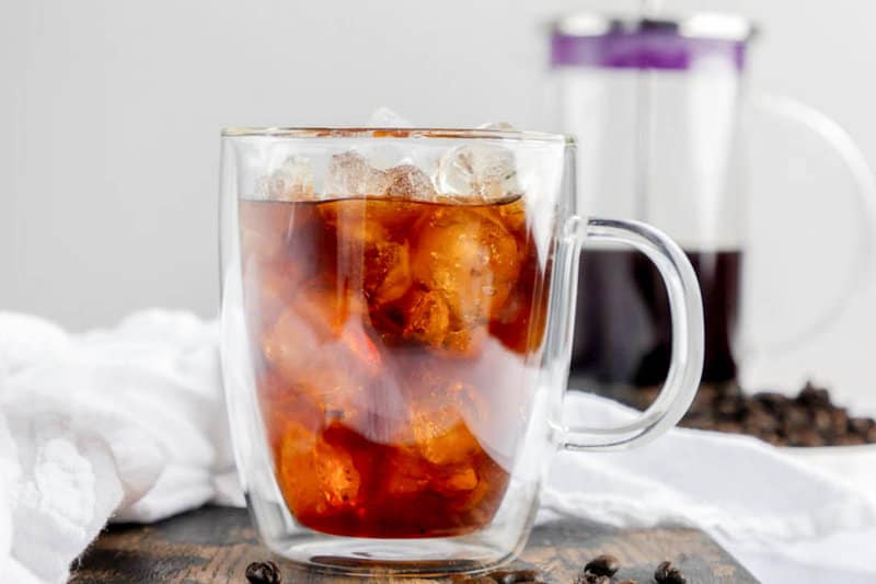 iced cold brew coffee in an insulated clear mug.
