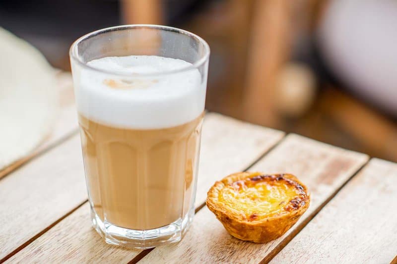 Portuguese galao drink and pastel de nata.