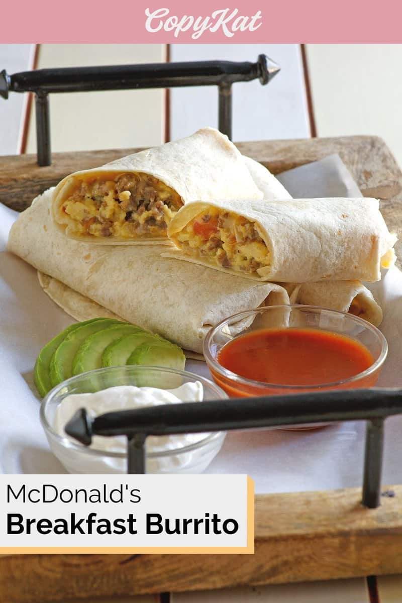 homemade McDonald's sausage breakfast burrito on a tray with sauces.