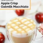 homemade Starbucks Apple Crisp Oatmilk Macchiato with apples in the background.