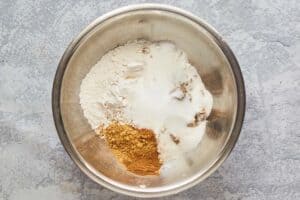 pumpkin muffins dry ingredients in a bowl.