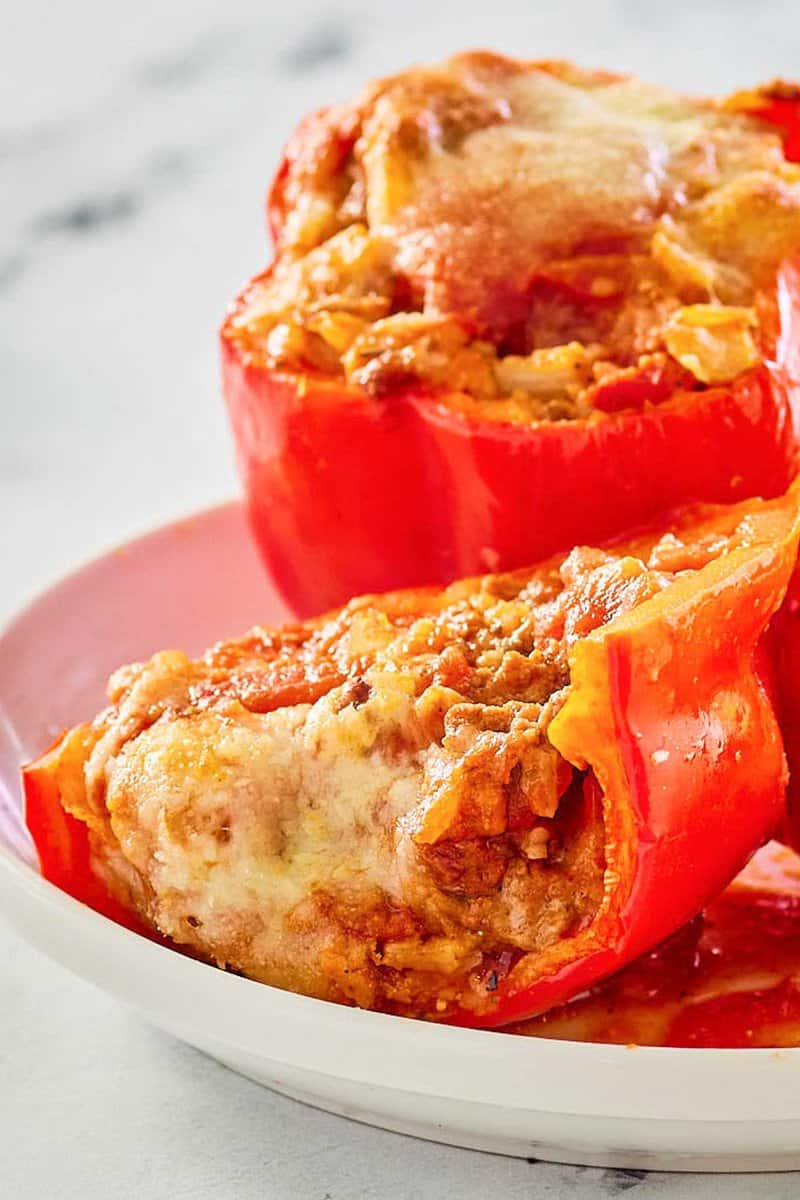 closeup of stuffed bell peppers on a plate.
