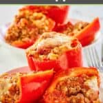 stuffed bell peppers with rice, meat, and sauce on plates.