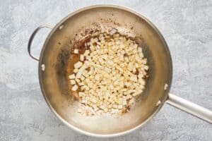 sautéed onions in a pan.