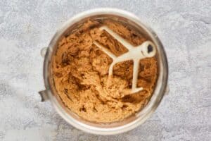 whole wheat banana bread dough in a mixing bowl.