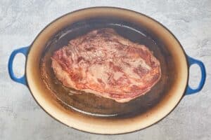 browning roast beef for Yankee pot roast in a Dutch oven.