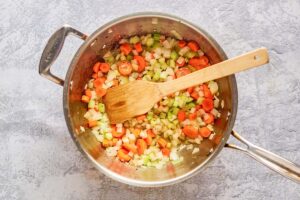 cooked chopped vegetables in a large pot.