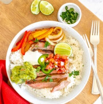 overhead view of copycat Chipotle steak bowl with rice and veggies.