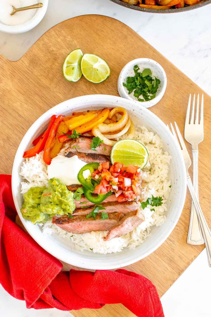 overhead view of copycat Chipotle steak bowl with rice and veggies.
