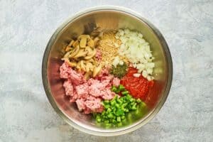 country beef pie crust ingredients in a mixing bowl.