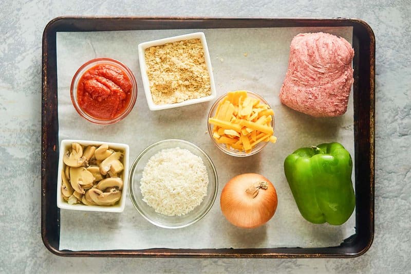 country beef pie ingredients on a tray.