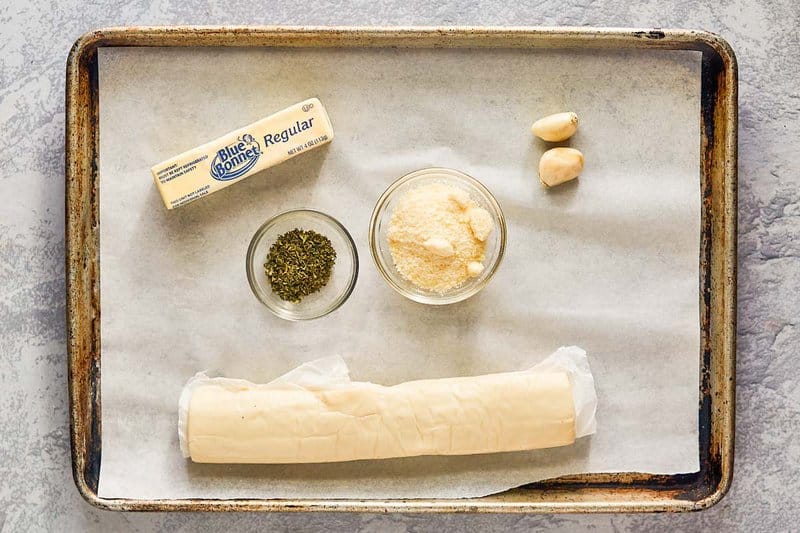 Domino's garlic bread twists ingredients on a tray.