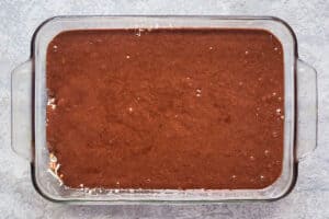 German chocolate cake batter in a baking dish.