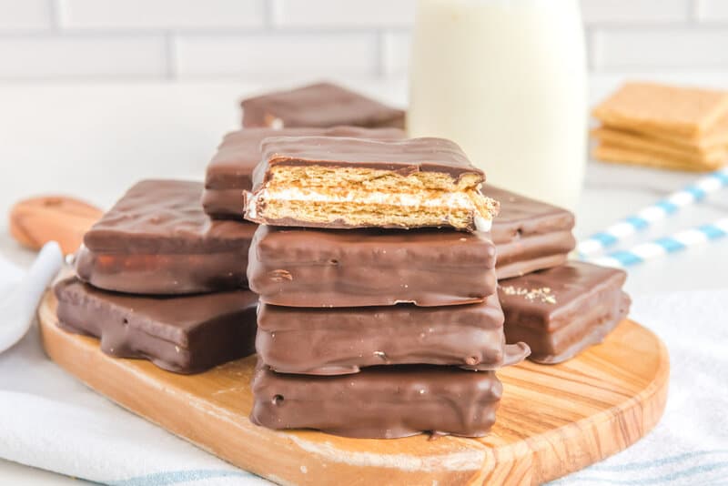 copycat Girl Scout s'mores cookies on a wood board.