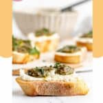goat cheese crostini canapes with pesto.