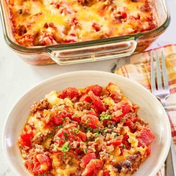 hamburger hash with cheese in a baking dish and bowl.