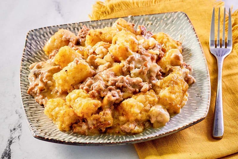 Mexican tater tot casserole serving on a plate.