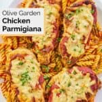 overhead view of homemade Olive Garden Chicken Parmigiana over pasta.