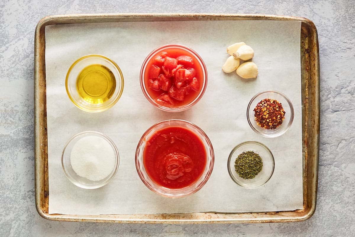 Olive Garden marinara sauce ingredients on a tray.