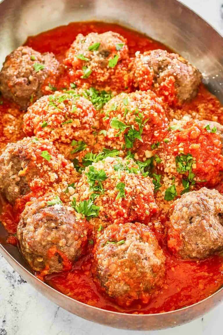 copycat Olive Garden meatballs and marinara in a skillet.