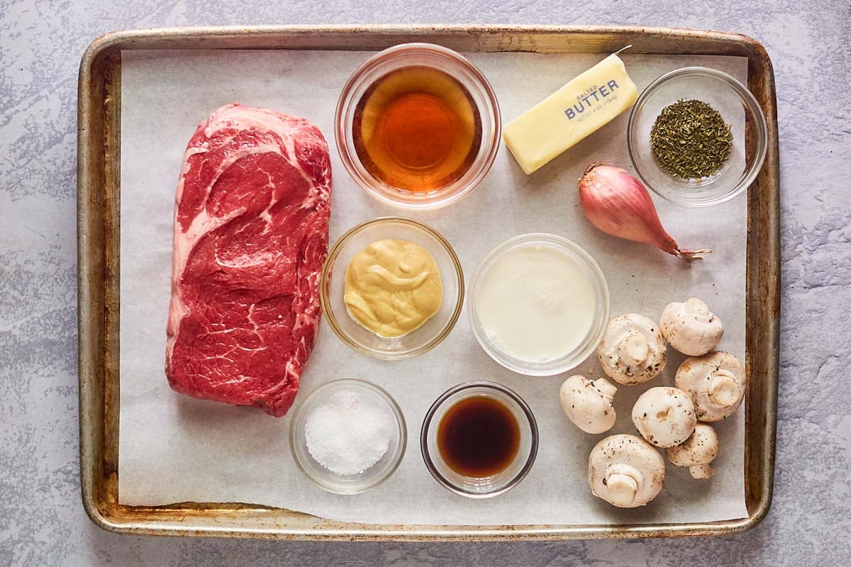 steak marsala ingredients on a tray.