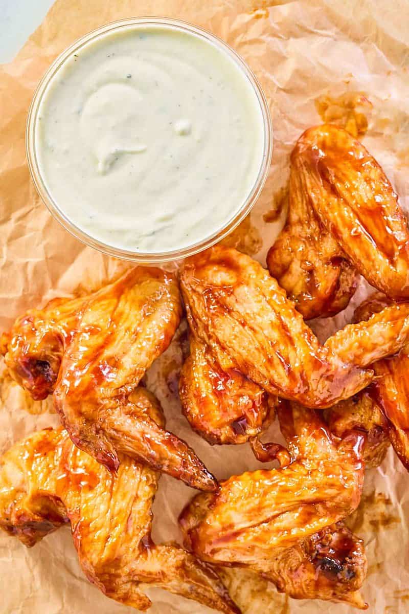 overhead view of copycat Wingstop ranch and chicken wings.