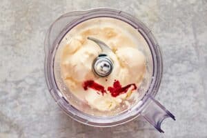 vanilla ice cream, milk, and peppermint extract in a blender.
