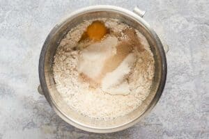 cinnamon roll dough ingredients in a bowl.