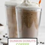 two Dunkin coffee coolatta drinks and coffee beans.