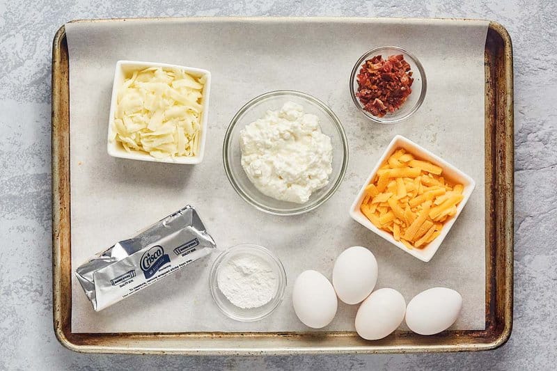 Dunkin bacon cheddar omelet bites ingredients on a tray.