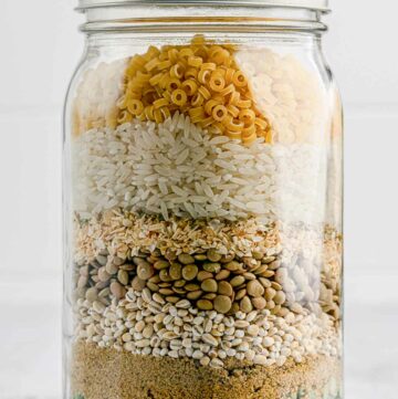 dry friendship soup mix ingredients layered in a jar.