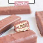 homemade kit kat candy bars and one cut in half to show the inside.