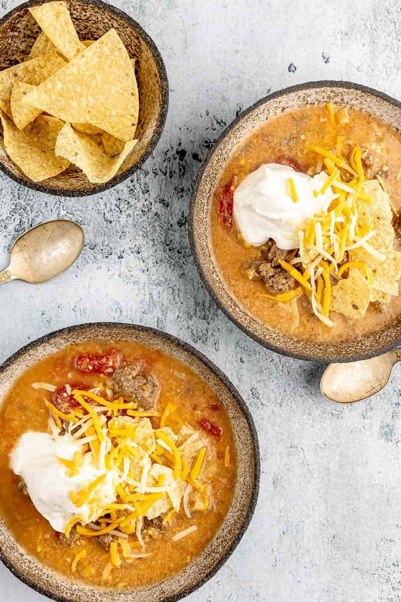 two bowls of copycat Luby's beef tortilla soup.