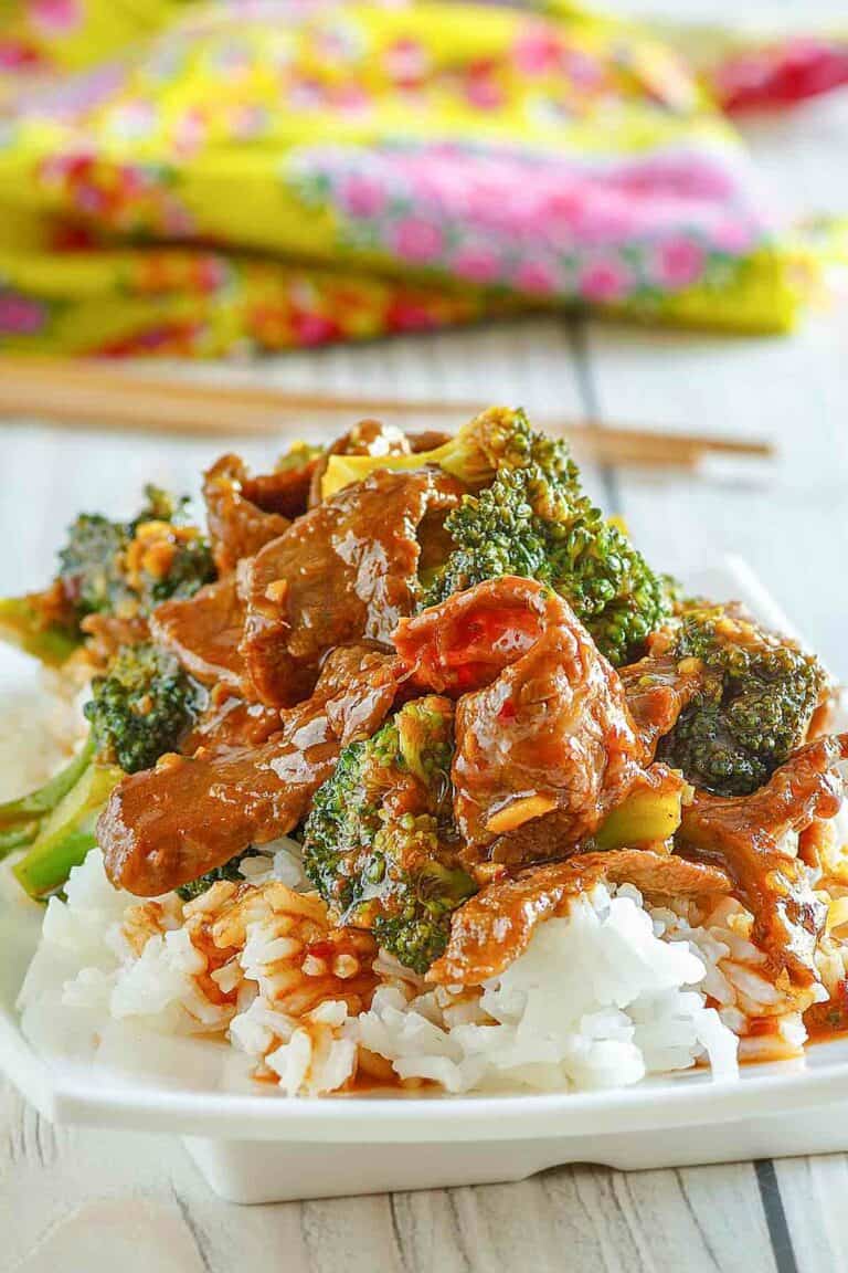 copycat Panda Express broccoli beef over rice on a plate.