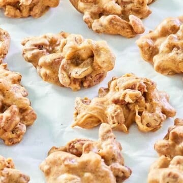 homemade pecan pralines on parchment paper.