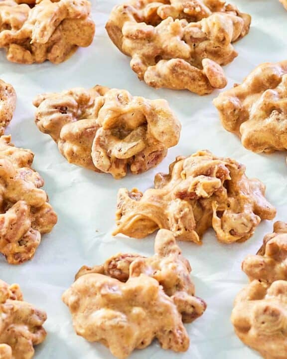 homemade pecan pralines on parchment paper.