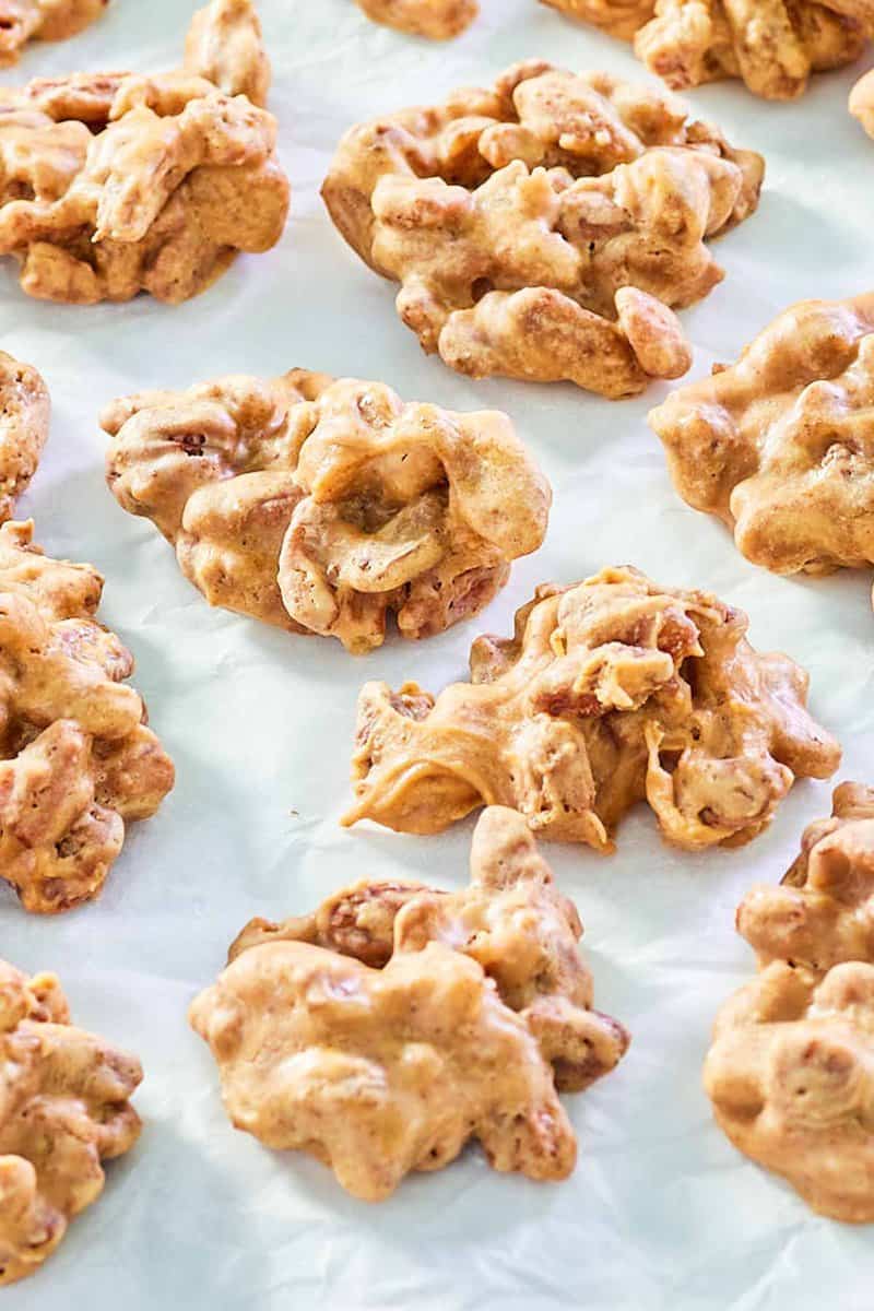 homemade pecan pralines on parchment paper.