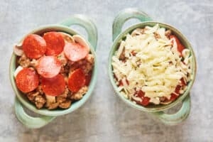 pizza bowls with various toppings before baking.