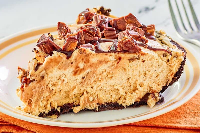 closeup of Reese's peanut butter pie slice on a plate.